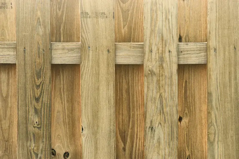 A new pine privacy fence, board on board